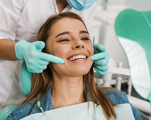 Woman smiling at the dentist