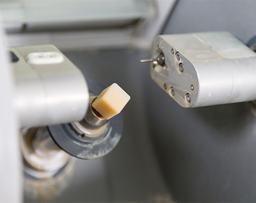 Close-up of ceramic block in CEREC machine