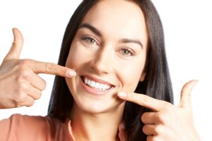 Close up of smiling woman looking at her teeth